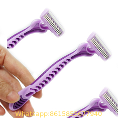 Pivot head triple blade razor with rubber handle